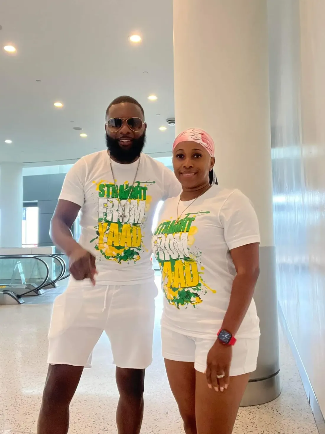 Two customers in matching Straight From Yaad tees